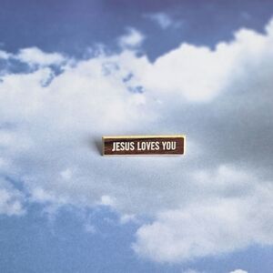 Vintage Brown & White 'Jesus Loves You' Pin